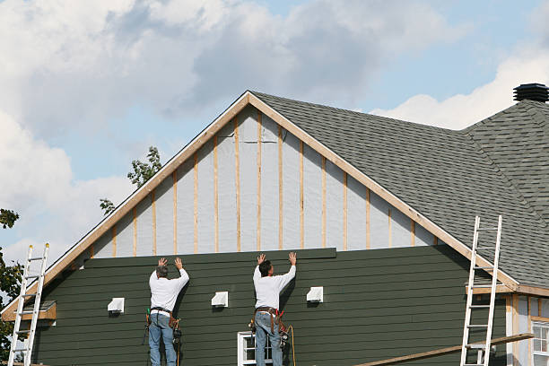 Professional Siding Installation technician working in Mechanicsburg, PA